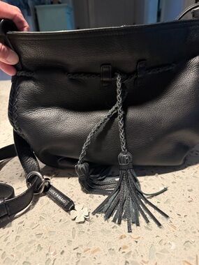 Lucky Brand Black Leather Braided Tassel Drawstring Crossbody Bag
